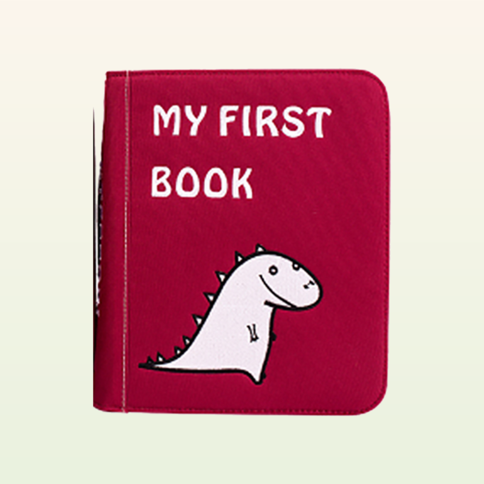 Mein Alltag Quiet Book geschlossen – rotes MY-FIRST-BOOK-Cover mit Dino auf sanftem cremefarbenem Hintergrund