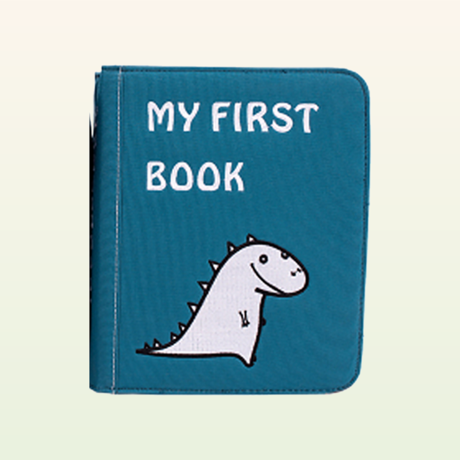 Mein Alltag Quiet Book geschlossen – blaues MY-FIRST-BOOK-Cover mit Dino auf sanftem cremefarbenem Hintergrund